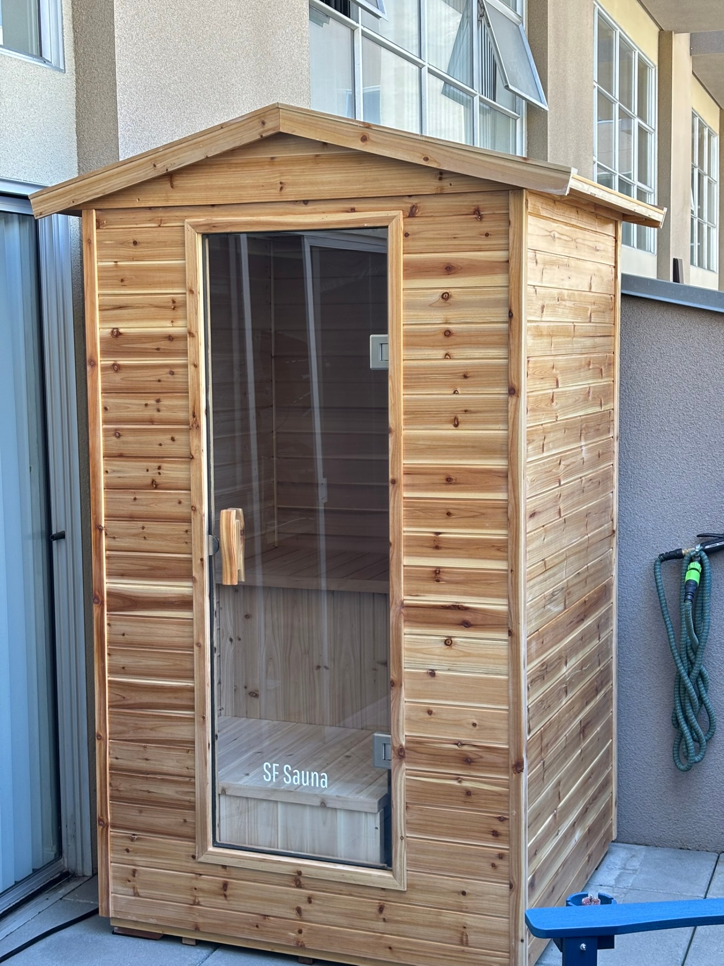 SF Sauna branded outdoor steam sauna installed on patio